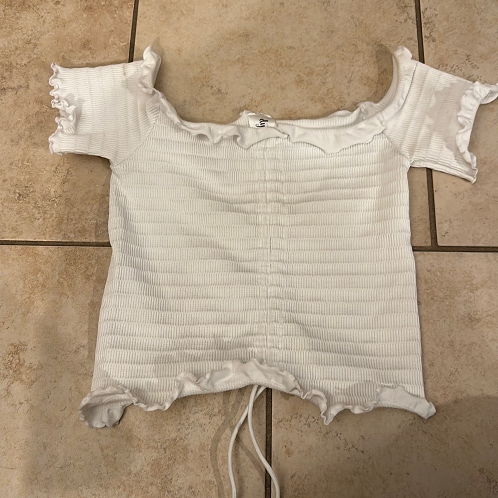 White off the shoulder tee with ties at the bottom
